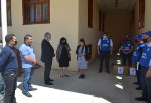 YAP Şəmkir rayon təşkilatının fəalları şəhid ailələrini ziyarət ediblər - FOTOLAR