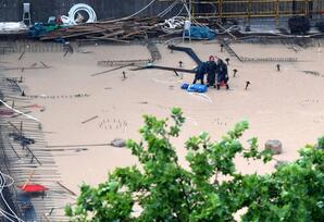 Şiddətli yağışlar 12 nəfərin ölümünə səbəb oldu - FOTOLAR