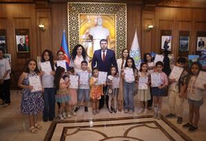 YAP Yasamal rayon təşkilatında “Uşaq hüquqlarını qoru” adlı rəsm sərgisi təşkil olunub - FOTO