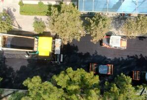 Bakının Zərifə Əliyeva küçəsində asfaltlanma işləri aparılır - FOTO/VİDEO