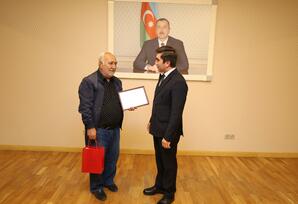 Partiya veteranları təltif edilib